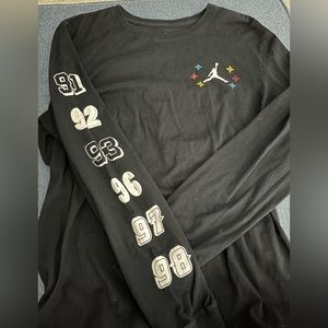 Men’s Michael Jordan brand long sleeved shirt. Black, size Medium.